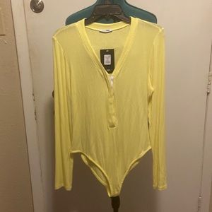 Womens long sleeve Bright Yellow Bodysuit w/snaps front NWT